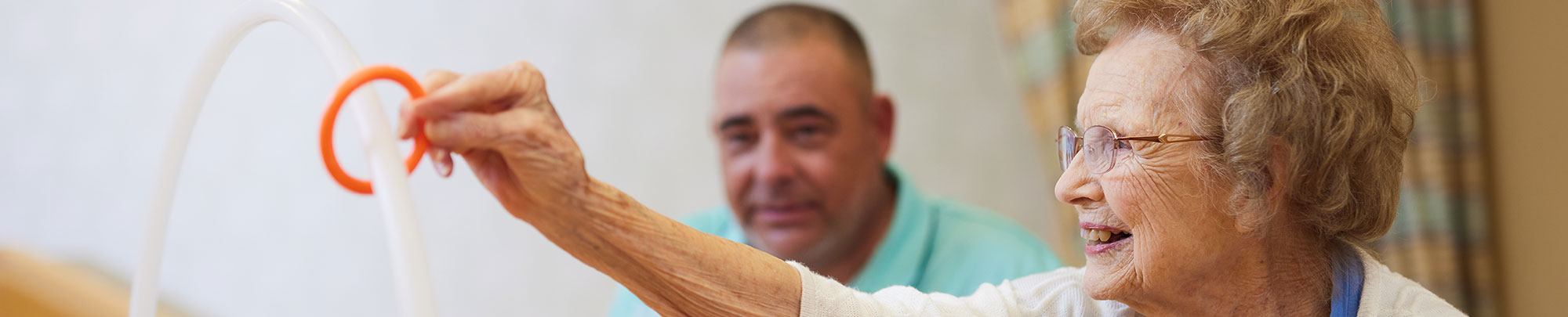 resident working with nurse